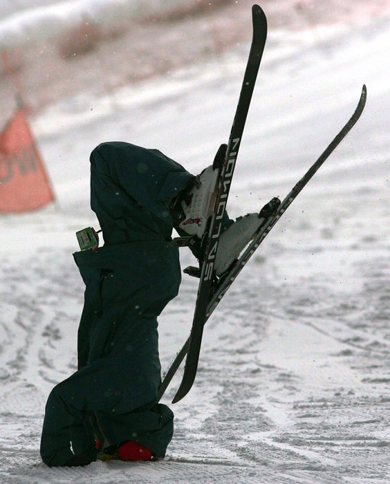 Award of Excellence, Photographer of the Year - Ken Love / Akron Beacon JournalMike Burrrows, 18, of Stow flips over on his skis while showing off for his friends at the Boston Mills Ski Resort. 