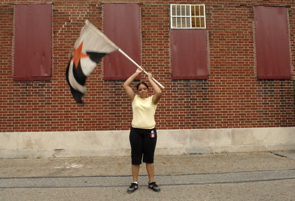 First Place, Student Photographer of the Year - David Foster / Kent State UniversityA member of the flag guard practices outside the rehearsal room, October 22, 2007. 