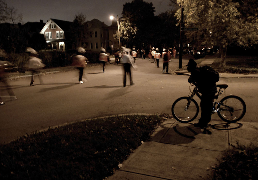 First Place, Student Photographer of the Year - David Foster / Kent State UniversityThough the neighborhood poses dangers to the band members, they march out of pride for the band and for the community. 