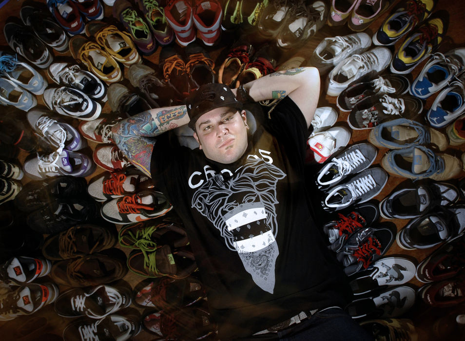 First Place, Student Photographer of the Year - David Foster / Kent State UniversityKris Schuster, is a local "sneakerhead" defined as a person who obsessively collects limited-edition and hard-to-find shoes. Schuster owns about 85 pairs and doesn't wear most of them, keeping them fresh in their original boxes. 