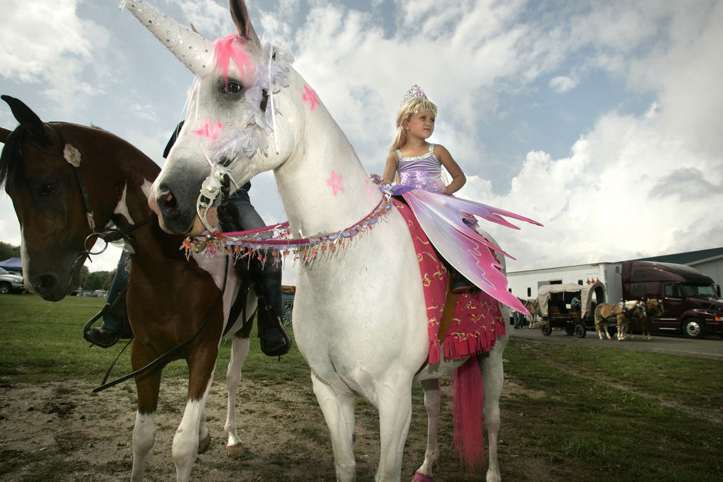 First Place, Student Photographer of the Year - David Foster / Kent State UniversityBryden Debolt, 5, of Westerville sits atop her horse, Bear, before the start of the All-Horse parade in Delaware, September 9, 2007. 