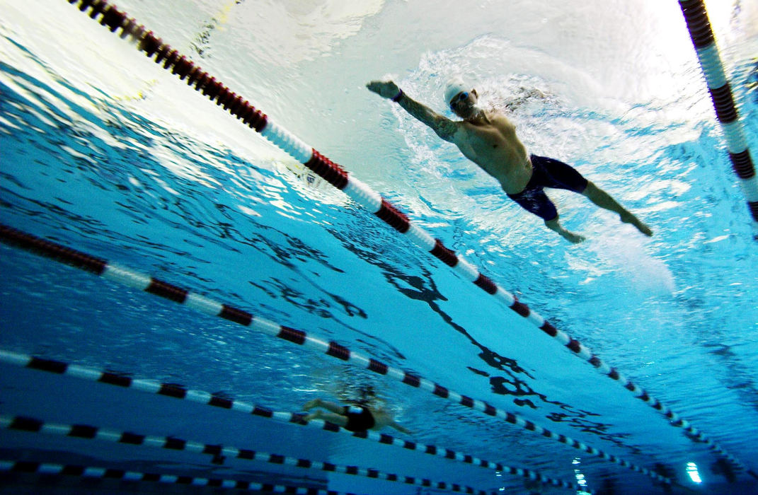 First Place, Sports Picture Story - Andy Morrison / The BladeTodd Crandall swims lap after lap at Sylvania Northview High School, May 7, 2007.