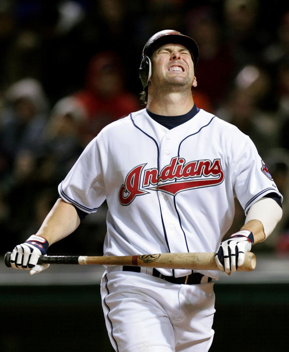 Second Place, Sports Picture Story - Chuck Crow / The Plain DealerCleveland Indians Trot Nixon is about to squeeze the sawdust out of the bat after striking out with the bases loaded in the 4th inning. Travis Hafner also struck out, killing a big opportunity for the Tribe. The Chicago White Sox won the game.