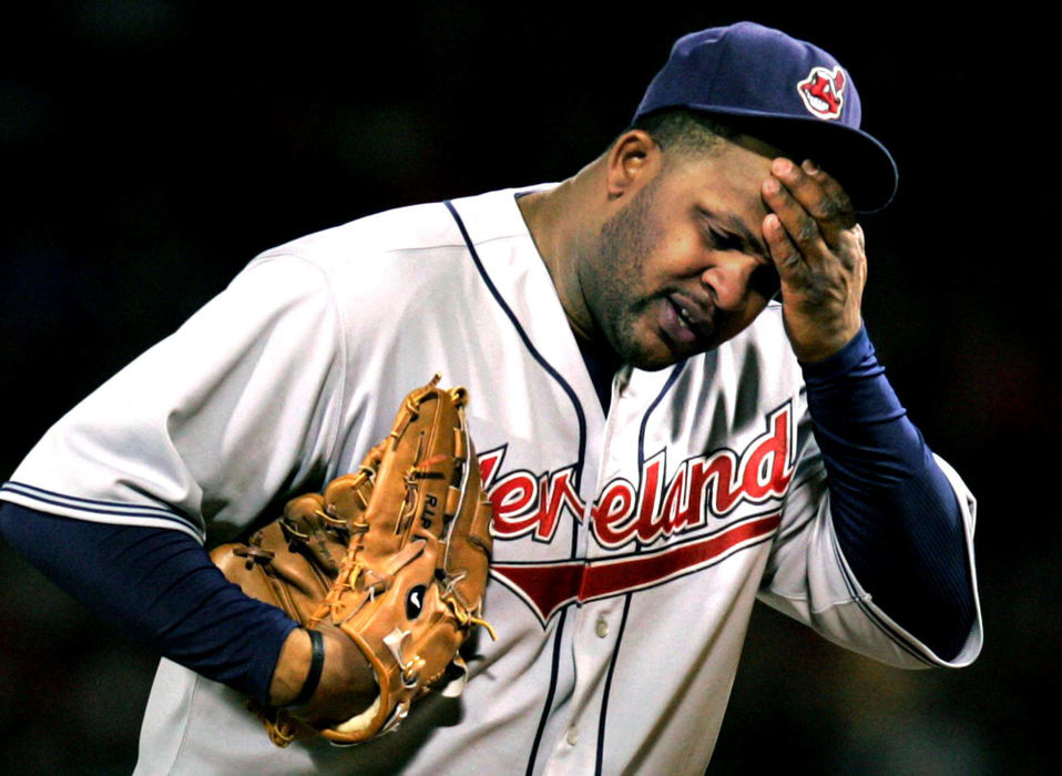 Second Place, Sports Picture Story - Chuck Crow / The Plain DealerAfter leading the Indians pitching staff all season long, (eventually winning the Cy Young award for the American League), pitcher C.C. Sabathia did not have it against the Red Sox and was yanked in the 5th inning of game 1 of the ALCS at Fenway Park in Boston. Boston won big 11-2.