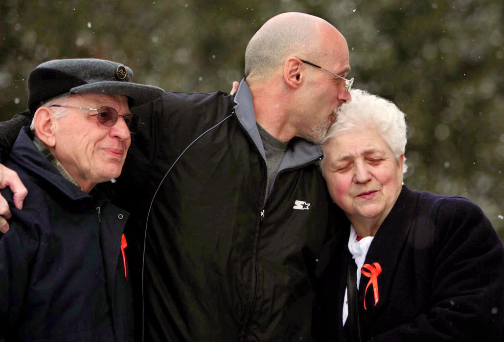 Third Place, Team Picture Story - Ken Love / Akron Beacon JournalBob Gondor, is joined by his his stepfather and mother, John and Julia Farago of Barberton, after leaving the Portage County Jail free on bond as he awaits a new trial in a 1988 murder case. 