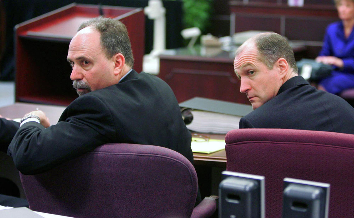 Third Place, Team Picture Story - Mike Cardew / Akron Beacon JournalDefense attorney Mark Marien (left) and defendant Randy Resh watch as potential jurors answer questions. Resh is being retried for the 1988 kidnapping, attempted rape and murder of Connie Nardi, 31, of Randolph Township.