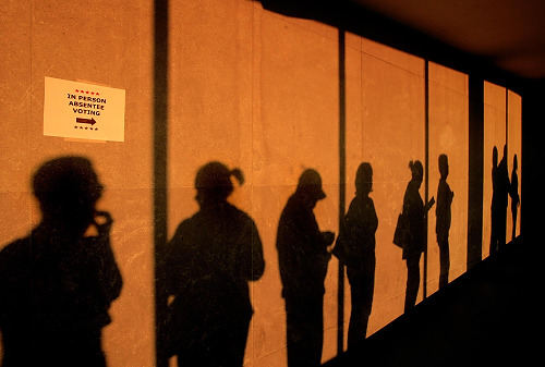 Second Place, Campaign 2008 - Chris Russell / The Columbus DispatchThe shadows of patient absentee voters form  a long line inside Veteran's Memorial Hall at dusk waiting their chance to vote in the 2008 presidential election.