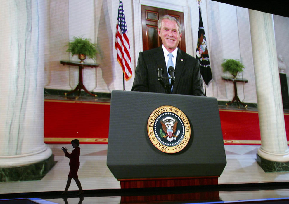 Award of Excellence, Campaign 2008 - Lisa Marie Miller / The Columbus DispatchLaura Bush leaves the stage after introducing her husband, President Bush on the second night of the Republican National Convention at the Xcel Energy Center in St. Paul, MN. President Bush addressed the crowd live from a satellite from the White House.  