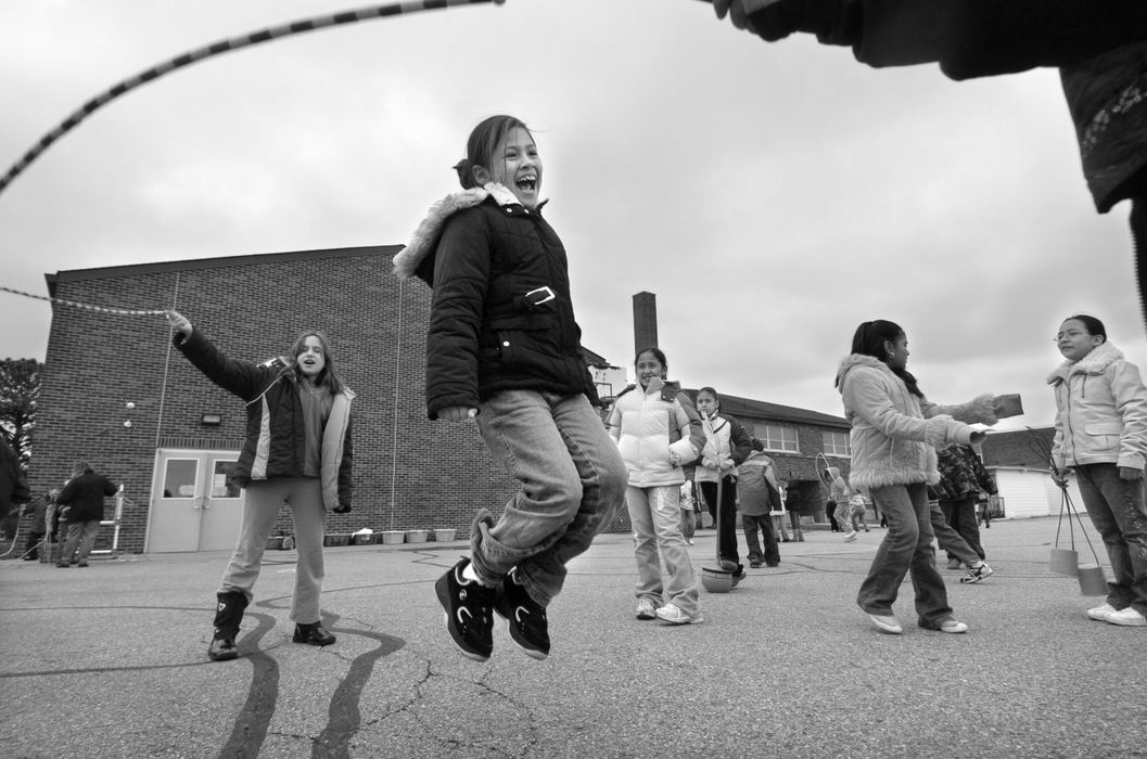 Third Place, Feature Picture Story - Carrie Cochran / The Cincinnati EnquirerFourth-grader Claudia Nava, 9, a U.S. citizen, plays during recess with her friends March 5, 2008 at Central Elementary in Fairfield. She started English as a Second language classes at Central Elementary this school year in Fairfield after moving from Los Angeles. She came to Ohio from Los Angeles six months ago with limited English, but she already helps her mom interpret street signs and labels at the grocery store. 