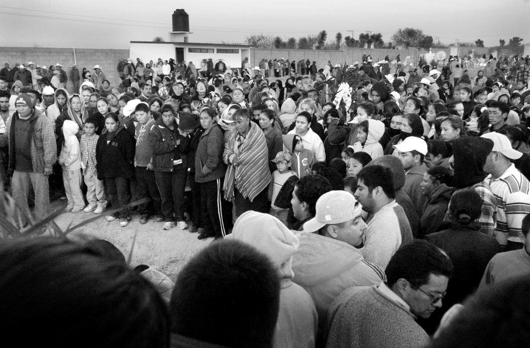 Second Place, News Picture Story - Carrie Cochran / Cincinnati EnquirerAfter walking for miles, the bodies were finally laid to rest a the edge of a cemetery at sundown. Brothers Manuel Davila Duenas Duenas, 31 and Jose de Jesus, 21, were buried side-by-side. Just a few feet away, their cousins Lino Guardado Davila, 45, and his nephew Conrado Lopez Guardado, 20, were buried.