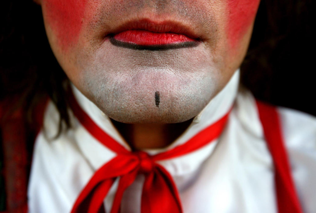 First Place, Photographer of the Year - Lisa DeJong / The Plain DealerGiovanni Zoppe paints his own face of makeup for every show when he performs as "Nino" the clown. 