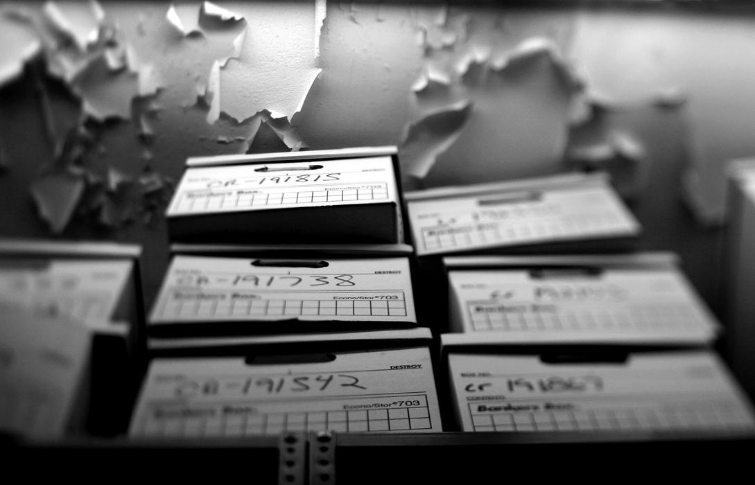 First Place, Photographer of the Year - Lisa DeJong / The Plain DealerConnors started her research in the basement of the Old Courthouse in Cleveland. Boxes piled to the ceiling hold files and trial transcripts. "In the hallway, towers of stacked boxes formed a cardboard canyon of mortgage foreclosures. Divorce actions... murder trials, rape trials." Connors writes. " I felt hollow. I had entered a repository of grief, a warehouse holding the collective pain, bitterness, fear and sorrow of the people of Cuyahoga County. "  Case Number Cr-193108: The State of Ohio v. David Francis, sat unread for more than 20 years. 