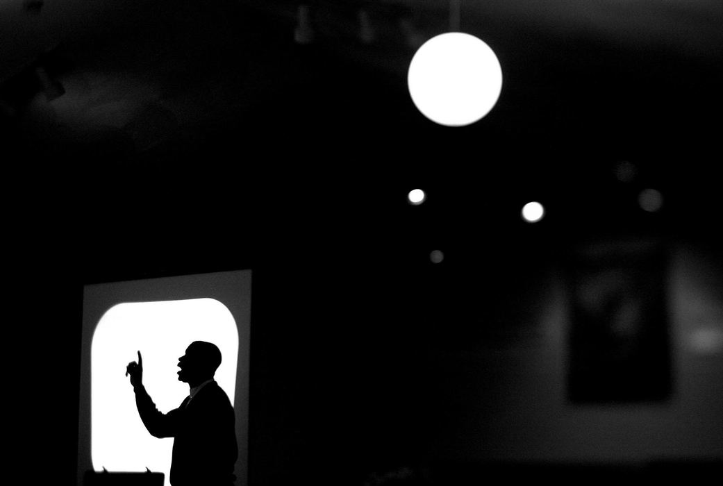 First Place, Photographer of the Year - Lisa DeJong / The Plain DealerPastor Anthony Singleton preaches at Emmanuel Christian Center in Cleveland, attended by Laura Wills, one of David Francis' sisters. "Say: 'How I was raised can't hurt me,' " he prompts. "Say: My past might be messed up, but my future is bright.' " For years, Laura Wills has fought drug addiction and depression, two things she blames on her violent childhood.      
