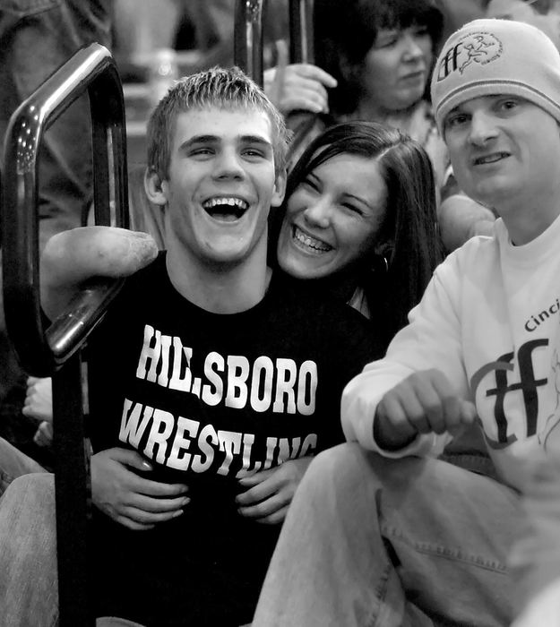 Second Place, Photographer of the Year - Michael E. Keating / Cincinnati EnquirerDustin Carter is tickled by his girlfriend as they sit together between matches.