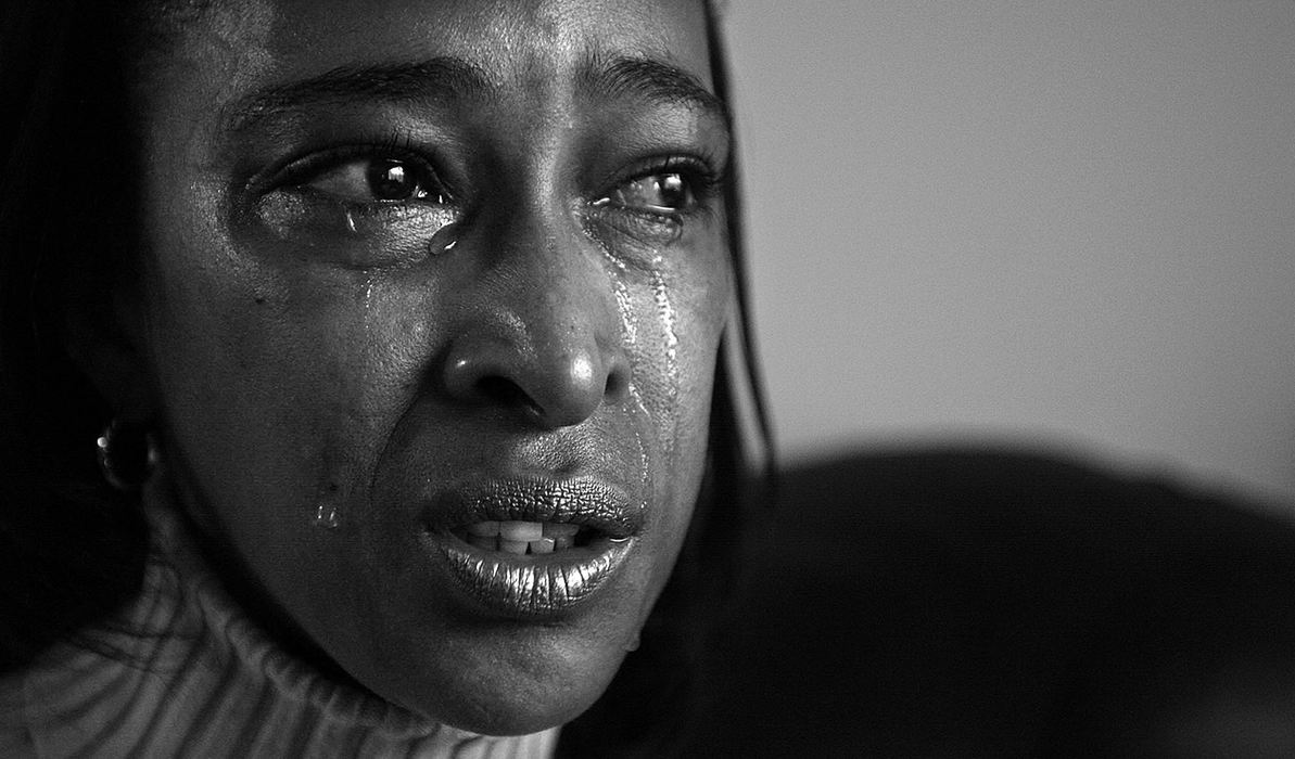 Second Place, Photographer of the Year - Michael E. Keating / Cincinnati Enquirer Janet Tate cries as she explains that she "fears she is a disappointment to her two daughters who have always looked up to her". Tate lost her job in a layoff at Duke Energy.