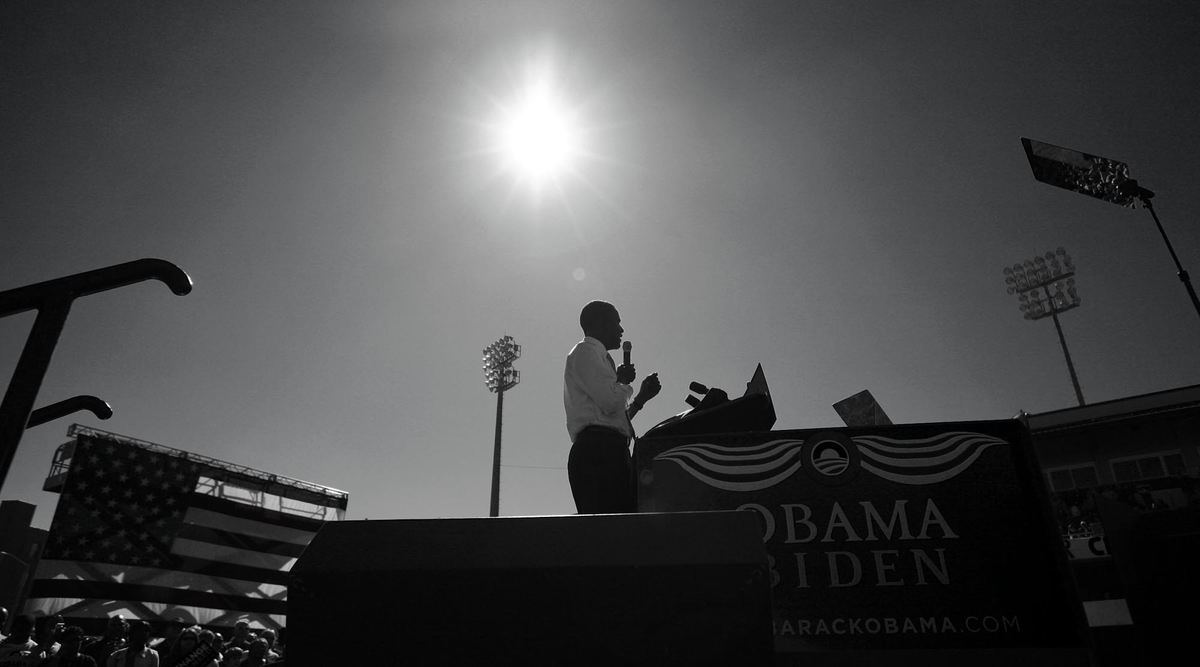 Second Place, Photographer of the Year - Michael E. Keating / Cincinnati EnquirerThe Obama campaign ran every day from morning and well into the night. The events often blended into a seamless portrait of a day on the campaign trail.  Here in the day's first event the sun shines down on candidate Barack Obama in Dayton.