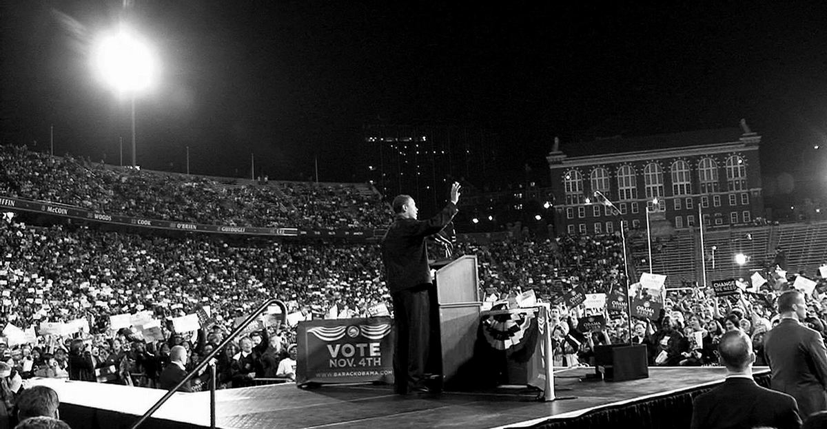 Second Place, Photographer of the Year - Michael E. Keating / Cincinnati EnquirerThe sky now dark is illuminated by stadium lights as Barack Obama winds up his stump speech.  It was one of three from the day, and in a few hours it will begin again. 