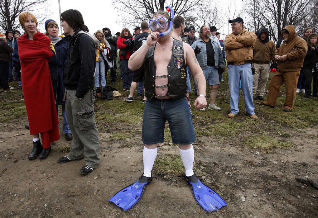 Award of Excellence, Portrait/Personality - Jeremy Wadsworth / The BladePretzel Koliner, of Westland, Mich, prepares to celebrate the New Year by jumping into the Maumee River, Jan, 1, 2008 in Waterville, Ohio. 