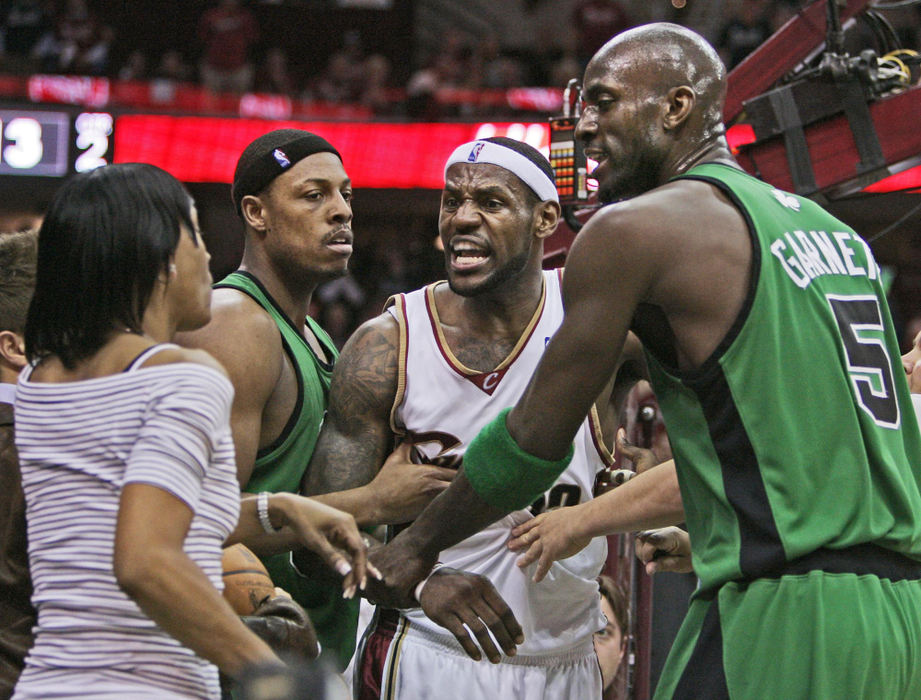 Award of Excellence, Sports Action - Mark Duncan / Associated PressCleveland Cavaliers' LeBron James (second from right) yells at his mother, Gloria (left) who left her seat after a foul on James by Boston Celtics' Paul Pierce (second from left) in the second quarter of Game 4 of the NBA  Eastern Conference semifinals, May 12, 2008, in Cleveland. Celtics' Kevin Garnett (5) plays peacemaker.
