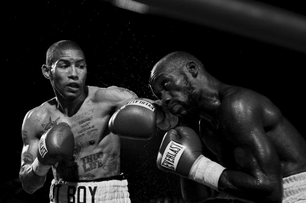 First Place, Student Photographer of the Year - Diego James Robles / Ohio UniversityFighting on top of the Frontier Field infield, (right) DeMarcus "Chop Chop" Corley is hit with a jab from Ashley “Treasure” Theophane, on July 31, 2008. Theophane defeated Corley in eight rounds by unanimous decision, in Rochester, N.Y. 