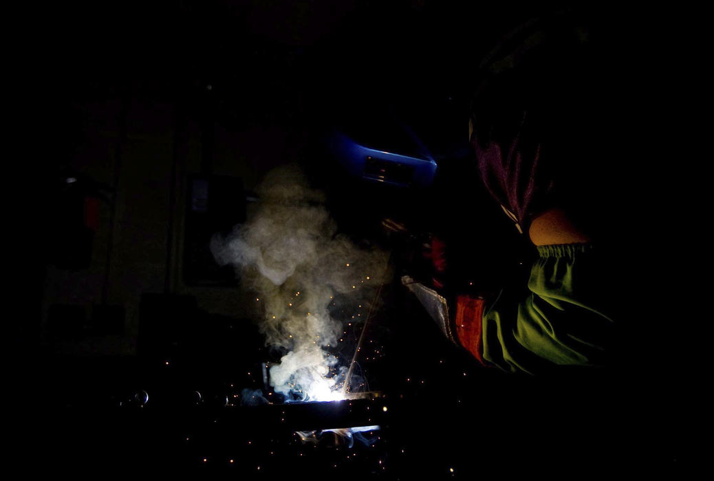 First Place, Student Photographer of the Year - Diego James Robles / Ohio UniversityMcGuire, a senior and football player at Logan High School, welds door hinges together during metal shop class. “I’m looking to go to college and welding is kind of my backup plan,” McGuire said. 