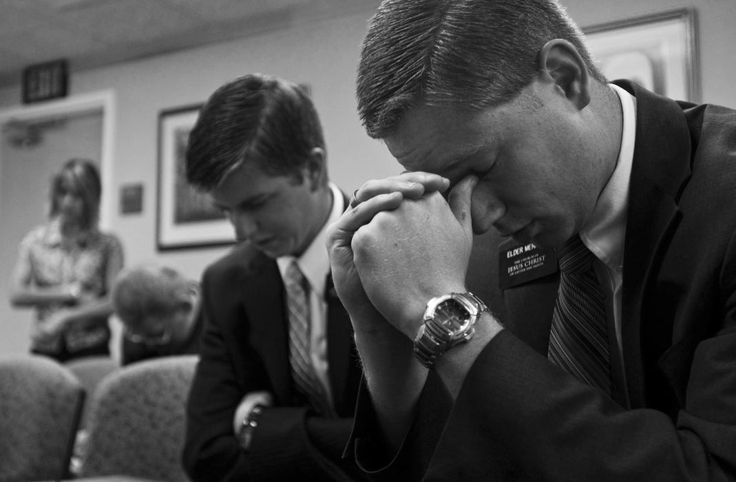 First Place, Student Photographer of the Year - Diego James Robles / Ohio UniversityThe Church of Jesus Christ of Latter-day Saints, otherwise know as the Mormon Church, believes that the Book of Mormon is a scriptural account of Jesus Christ in the Americas and on par with the Bible.The Church currently claims over 10 million members world-wide with approximately 50,000 of those serving as missionaries far from their homes. Single members between the ages of 19 and 25 are encouraged to fulfill their duty by spreading the gospel for two years. Elder Bradley Merrill of Littleton, Colo. and Elder Todd Balls of Mesa, Ariz., pray with members, during Sunday services in The Plains, Mormon church, on May 25, 2008.