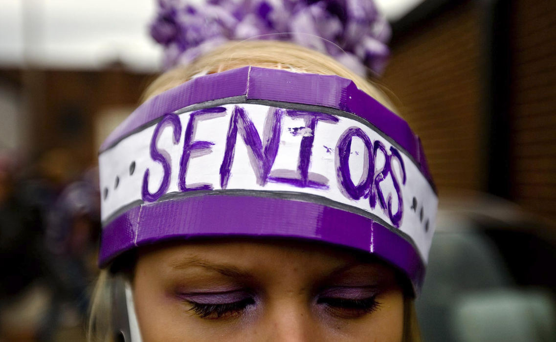 First Place, Student Photographer of the Year - Diego James Robles / Ohio UniversityJillyan Kline, 17-year-old senior, wears a traditional papier-mâché hat during game day on Friday.