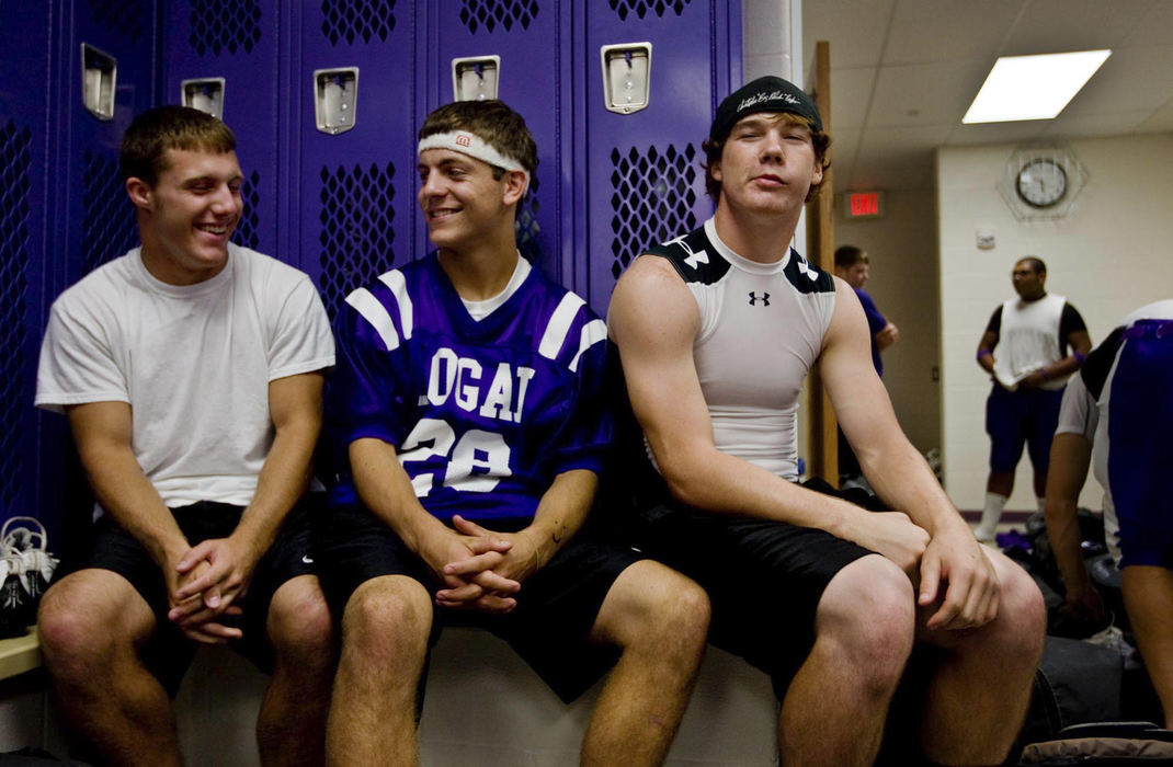 First Place, Student Photographer of the Year - Diego James Robles / Ohio UniversityMembers of the varsity squad share a laugh before suiting up for the game.