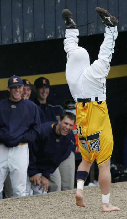 Third Place, Sports Picture Story - Phil Masturzo / Akron Beacon JournalKent State catcher Cory Hindel's antics kept teams from both dugouts entertained.