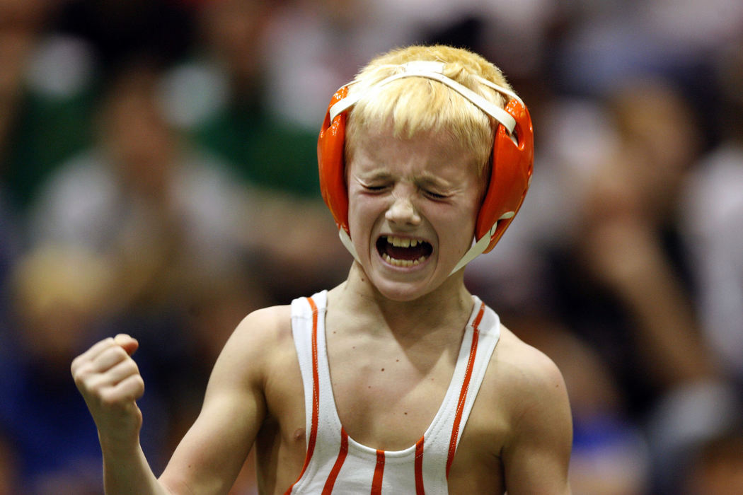 Award of Excellence, Sports Picture Story - Tracy Boulian / The Plain DealerTyler Warner, 11, of Dennison, a wrestler for Claymont, reacts after winning the 60 lb state title at the Ohio Youth Wrestling state tournament at Firestone High School in Akron on February 10, 2008. Warner has been wrestling for 5 years. 