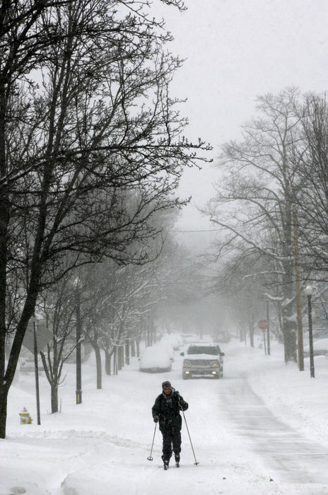 First Place, Team Picture Story - Lisa Marie Miller / The Columbus DispatchCandy Canzoneri makes her way  through the record snowfall in Westerville by cross country skies on College Avenue during the mid morning hours.