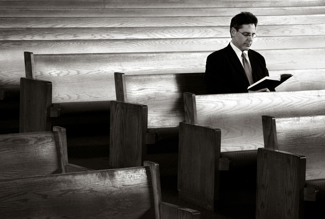 Second Place, Feature Picture Story - Andy Morrison / The BladeNeil Light reads from Gates of Prayer at Temple-Congregation Shomer Emunim.  Faith is "...something that I would rely on and act on even though I can't prove it. To me, faith is the antidote for fear. So many things in life are subject to being questioned and we wonder about things and we have fears: fears of the unknown, fears of the future, fears of death, sometimes fears of taking courageous action, and I think having faith helps you get over your fears. My faith in Judaism, it ties in because it gives me direction in how to act, in how to live my life. Neil Light, Reform Jew, 55, Ottawa Hills