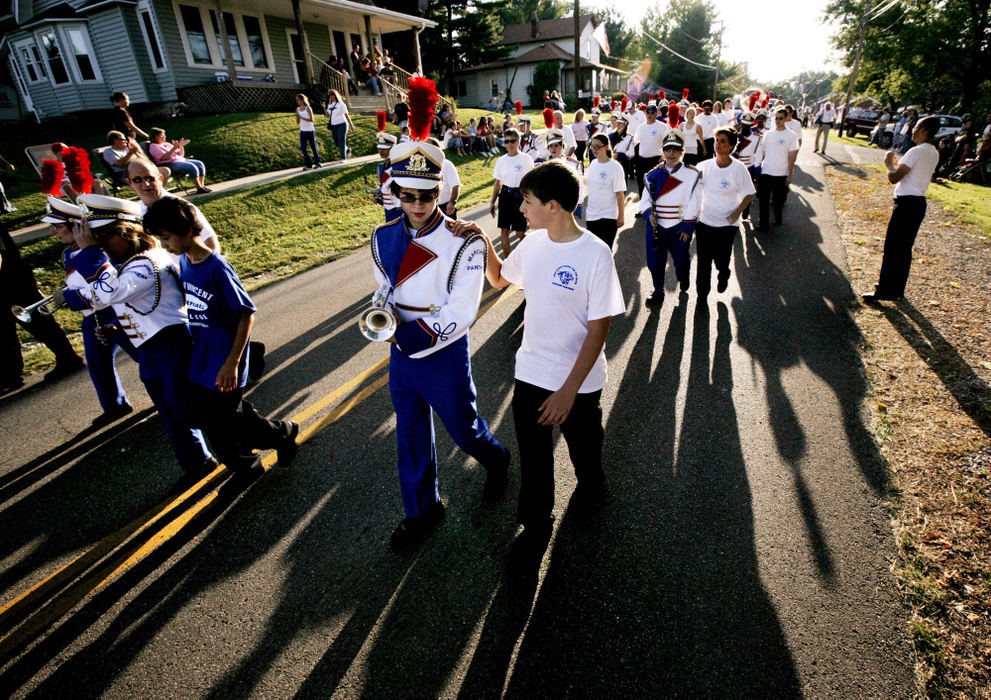 Third Place, Feature Picture Story - Fred Squillante / The Columbus DispatchWith marching assistants guiding the way, the Ohio State School for the Blind marching band marches in the Millersport Sweet Corn Festival parade in Millersport.