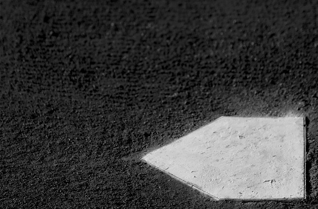 Award of Excellence, Photographer of the Year Large Market - Michael E. Keating / Cincinnati EnquirerFrom the shadows of batting cage netting, hitters in the cage and empty bleachers in the sun, water bottles stacked in storage to a freshly painted home plate, helmets lined up in a row, and infield dirt being harrowed to perfection the details of objects associated with baseball can be a beautiful thing. 