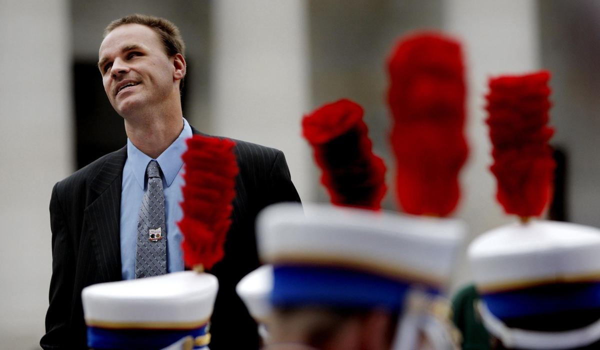 First Place, Photographer of the Year Large Market - Fred Squillante / The Columbus DispatchOhio State School for the Blind marching band co-director Dan Kelley, who is also blind, directs the band during an outdoor performance at the Ohio Statehouse.