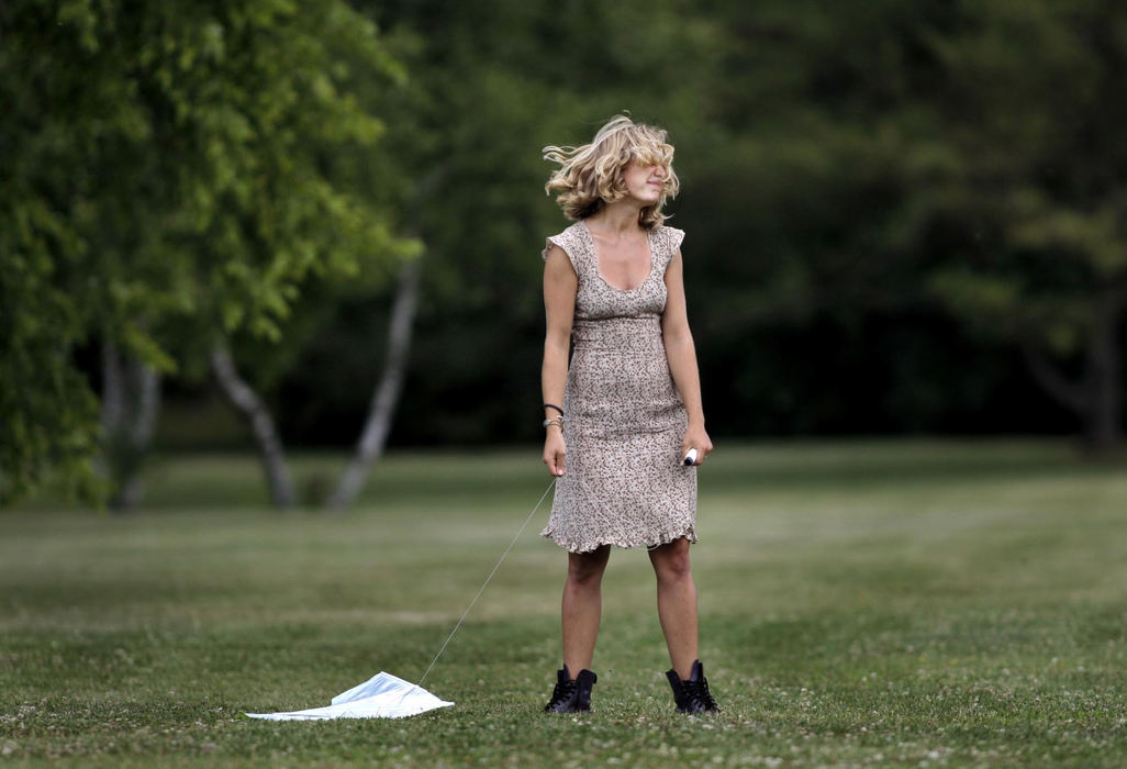 First Place, Photographer of the Year Large Market - Fred Squillante / The Columbus DispatchNo matter how hard they tried, Rachel Keller and Charlie McCarthy (not pictured) couldn't get their kite aloft at a park in Columbus. 