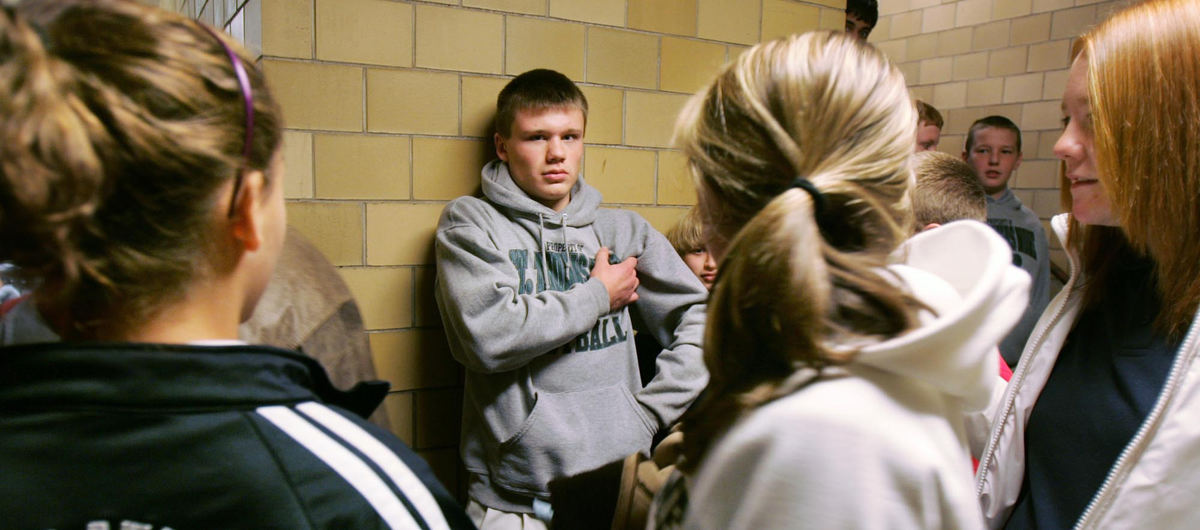 Third Place, Photographer of the Year Large Market - John Kuntz / The Plain DealerIan Stuart catches the attention of some of his female classmates in the hall at St. Thomas More School in Brooklyn November 12, 2009 as the group heads to the lunchroom.   