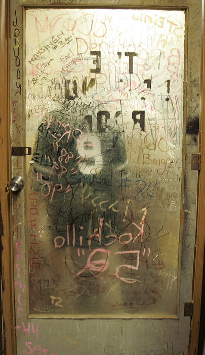 Third Place, Photographer of the Year Large Market - John Kuntz / The Plain DealerAfter attending the team banquet in November, St. Thomas More School football players enter the equipment room by themselves close the door and sign their names. Every inch of the interior of the trailer is covered with signatures - loopy scrawls and cramped letters - as every football player who leaves the program leaves his name in permanent marker in two different places inside the trailer. 