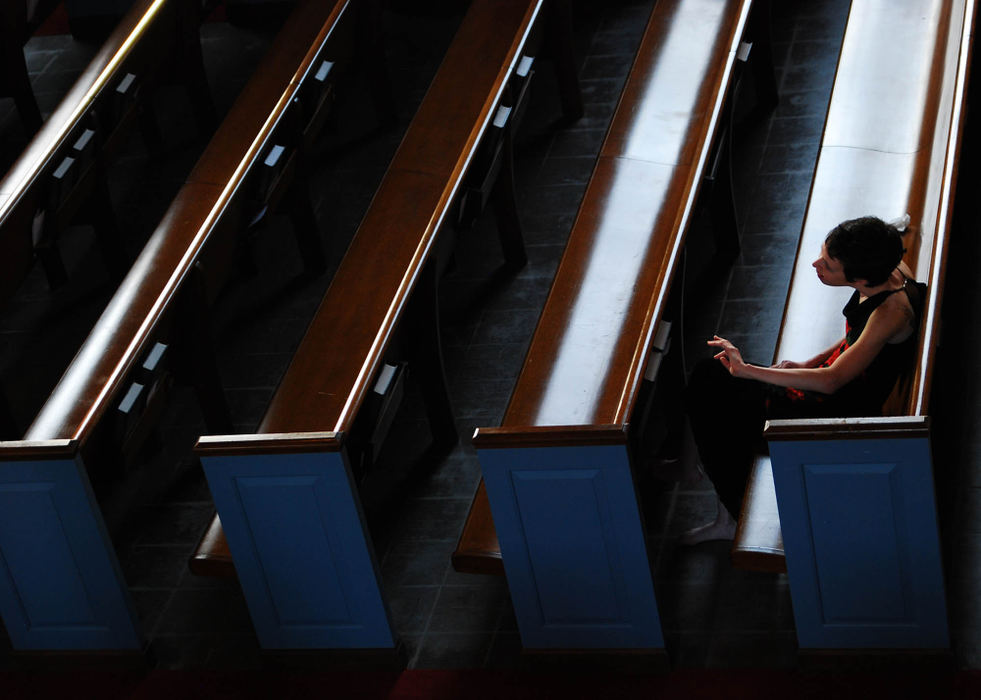 Third Place, Photographer of the Year Small Market - Tessa Bargainnier / Kent State UniversityAllie Friedrich sits in the pews of First Unitarian Church of Cleveland in Shaker Heights after her dance performance at the altar. She has cerebral palsy and is a professional dancer with the Verlezza Dance Company. “Within the studio and within the stage,” she said, “is the only place I’m not disabled. I’m just a dancer.”