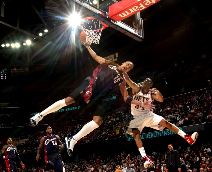 First Place, Sports Action - Joshua Gunter / The Plain DealerCleveland Cavaliers' Jamario Moon gets fouled from behind by the New Jersey Nets' Devin Harris in the fourth quarter at Quicken Loans Arena. Harris was called for a flagrant 2 and was ejected. The Cavs won the game 99-89. 