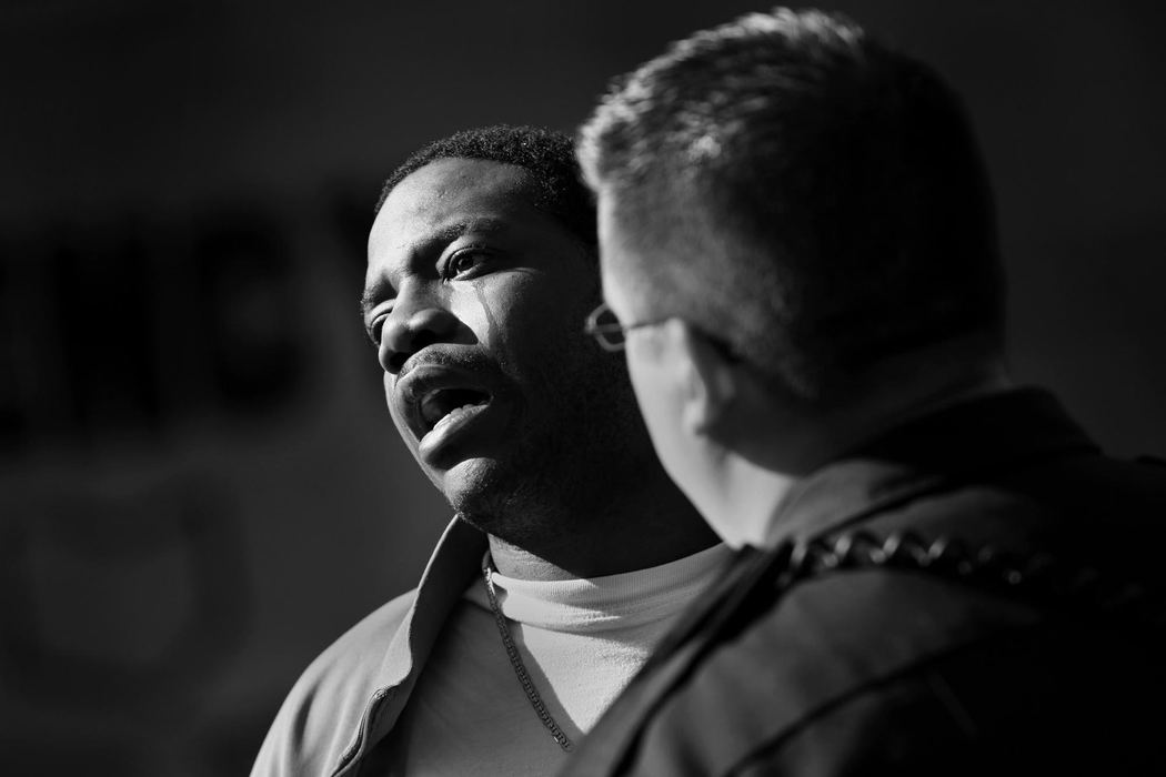 First Place, Spot News (over 100,000) - Gus Chan / The Plain DealerCuyahoga Metro Housing Authority police officer Robert Weis talks to a drug suspect, May 12, 2009.  The suspect had a warrant for missing traffic court and was let go with a friendly warning. 