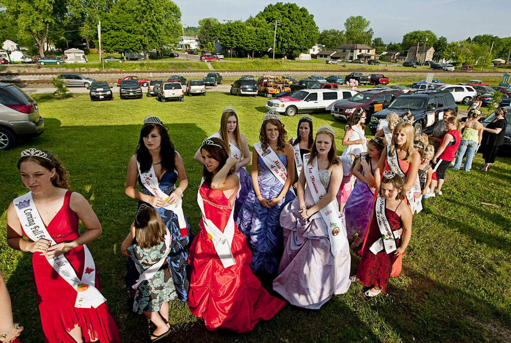 First Place, Student Photographer of the Year - Diego James Robles / Ohio UniversityMoments before the coronation, more than a dozen beauty queens from in-and-around Southeast Ohio wait for their turn to address a small crowd of Chauncey residents. Queens and runners-up of every beauty pageant are by regulation obligated to represent their pageant at other nearby pageants and events.  