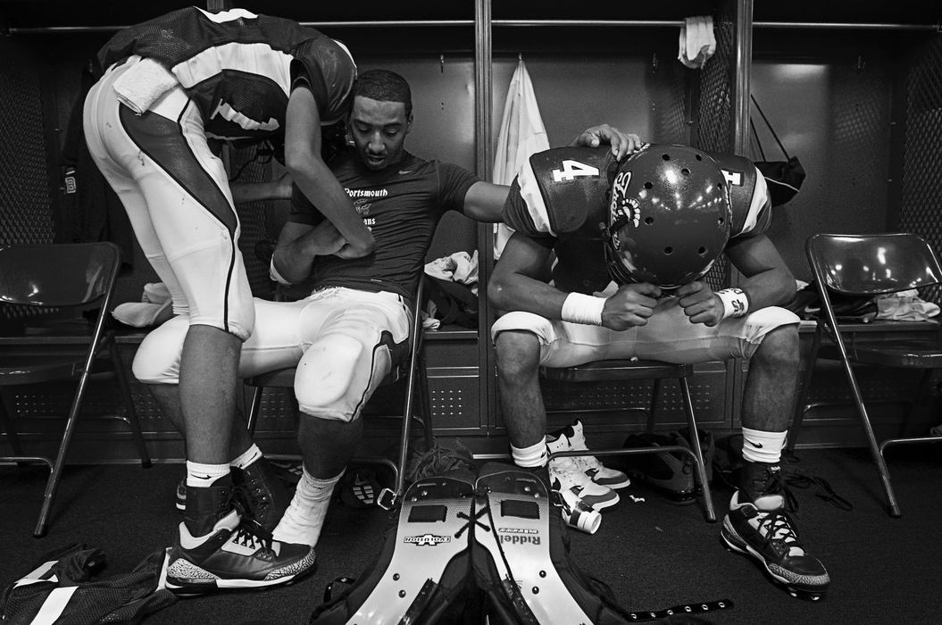 First Place, Student Photographer of the Year - Diego James Robles / Ohio UniversityAfter a one point loss on the last possession of the game, London Malone (left) cries with teammates Jaylen Kennedy and Curt Clifford. The Portsmouth High School Trojans lost to the Jackson High School Ironmen in Portsmouth, 27-26, on Sept. 18, 2009. "I promise to do everything in my power to never lose another football game ever again," Kennedy said while sobbing. 