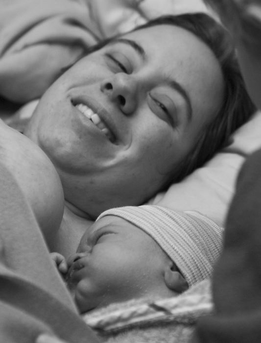 Third Place, Student Photographer of the Year - Laura Torchia / Kent State UniversityIn the comfort of her own bed with newborn son Jonah, Atije enjoys the first bonding moments.