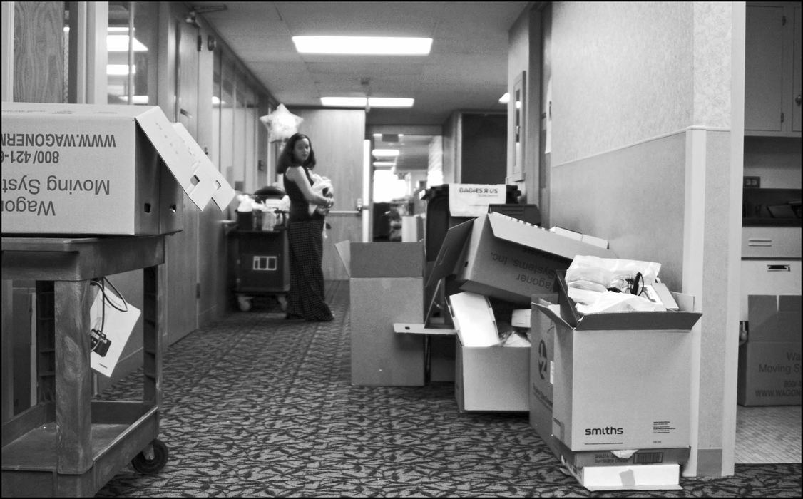 Third Place, Student Photographer of the Year - Laura Torchia / Kent State UniversitySylvia Reed walks her newborn through the empty halls among boxes she and her coworkers had packed over the previous few weeks.