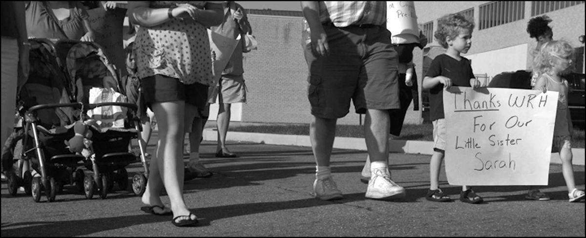 Third Place, Student Photographer of the Year - Laura Torchia / Kent State UniversityStaff spend their emotional last hours on the ward reflecting on the community that will be gone come the end of the workday.  Some of the 33 who lost their jobs had been on the ward at WRH for more than 20 years.