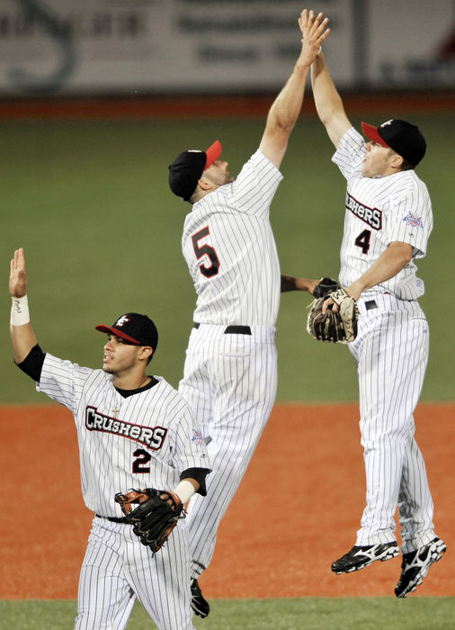 First Place, Sports Picture Story - David Richard / FreelanceThe city of Avon built a new baseball stadium and signed a deal with the Frontier League to bring a team to the area. Little did anyone know that less than a year later, the players of the Lake Erie Crushers would bring the League Championship trophy to the city with a dramatic, come-from-behind win. The Lake Erie Crushers got the season started on the right foot with a win in front of their new fans at their new stadium.