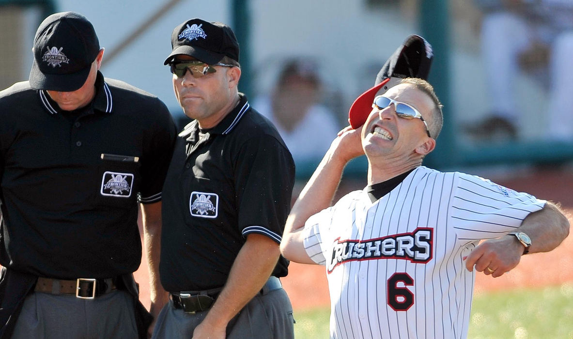 First Place, Sports Picture Story - David Richard / FreelanceThe Crushers hit a low point at the midway point of the season and manager John Masserelli (right) finally erupted after two balk calls against his pitching staff. He was ejected.