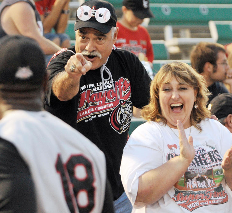 First Place, Sports Picture Story - David Richard / FreelanceCrushers super fans chartered a bus for a 10-hour ride to Missouri to watch their team in the deciding Game 5 of the Frontier League Championship Series. 