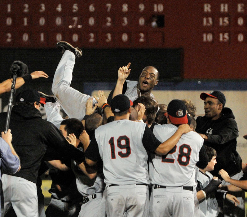 First Place, Sports Picture Story - David Richard / FreelanceThe Crushers fought their way to the championship round and after losing the first two games, came back to tie the series. The Crushers then stunned host River City, MO., with a come-from-behind win in the championship game to win the Frontier League title.